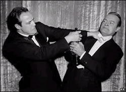 Marlon Brando and Bob Hope, pretending to struggle over a Brando's Oscar in 1954